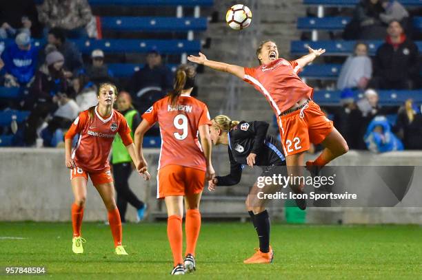 Houston Dash defender Amber Brooks is pushed in the back Chicago Red Stars midfielder Alyssa Mautz on May 12, 2018 at Toyota Park in Bridgeview,...