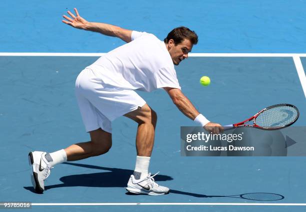 Tommy Haas of Germany plays a backhand in his third round match against Jo-Wilfried Tsonga of France during day three of the 2010 Kooyong Classic at...