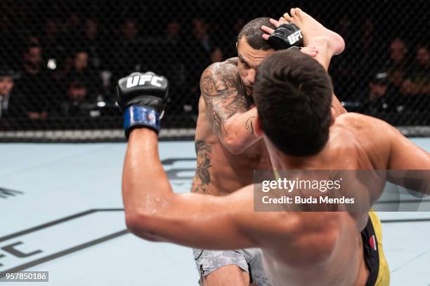 Lyoto Machida of Brazil kicks Vitor Belfort of Brazil in their middleweight bout during the UFC 224 event at Jeunesse Arena on May 12, 2018 in Rio de...