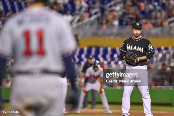 Junichi Tazawa of the Miami Marlins pitches in the eighth inning against the Atlanta Braves at Marlins Park on May 12, 2018 in Miami, Florida.