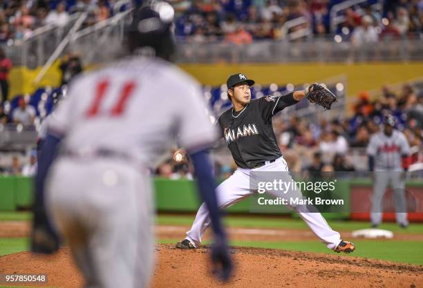 Junichi Tazawa of the Miami Marlins pitches in the eighth inning against the Atlanta Braves at Marlins Park on May 12, 2018 in Miami, Florida.