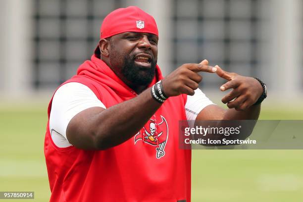 Defensive line coach Brentson Buckner gives instructions during the Tampa Bay Buccaneers Rookie Minicamp on May 12, 2018 at One Buccaneer Place in...