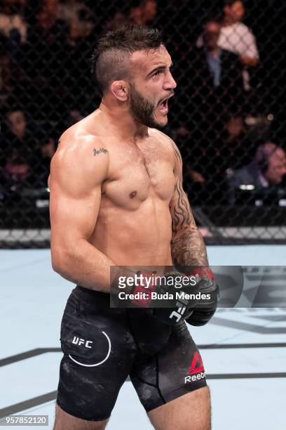 John Lineker of the Brazil celebrates victory over Brian Kelleher of the United States in their bantamweight bout during the UFC 224 event at...