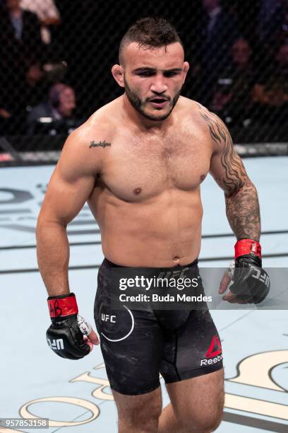 John Lineker of the Brazil celebrates victory over Brian Kelleher of the United States in their bantamweight bout during the UFC 224 event at...