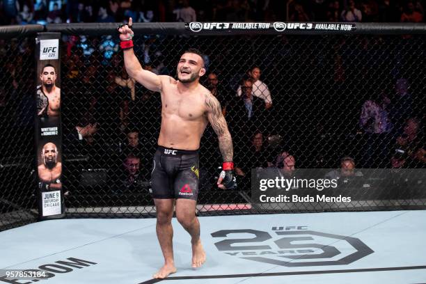 John Lineker of the Brazil celebrates victory over Brian Kelleher of the United States in their bantamweight bout during the UFC 224 event at...