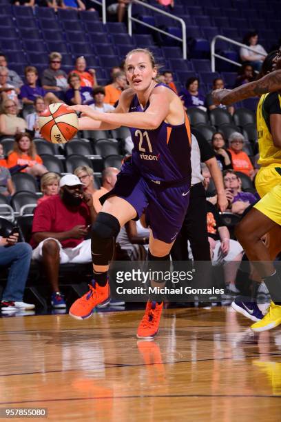 Marie Gulich of the Phoenix Mercury drives to the basket against the Seattle Storm during a pre-season game on May 12, 2018 at Talking Stick Resort...