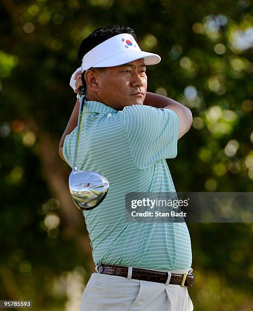 Choi of South Korea hits from the first tee during the first round of the Sony Open in Hawaii held at Waialae Country Club on January 14, 2010 in...