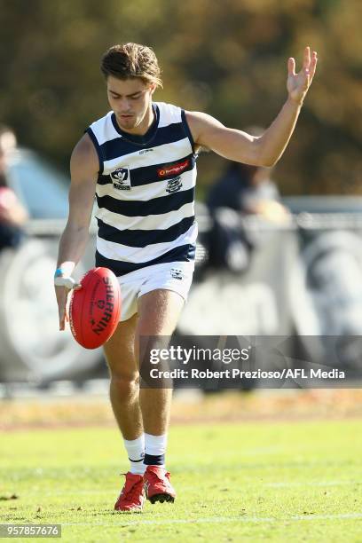 Harrison Kol of Geelong Cats kicks during the round six VFL match between the Collingwood Magpies and the Geelong Cats at Olympic Park on May 13,...