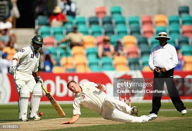 Peter Siddle of Australia attempts to field off his own bowling during day two of the Third Test match between Australia and Pakistan at Bellerive...