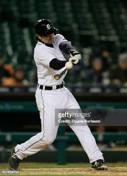 Pete Kozma of the Detroit Tigers hits a double to drive in JaCoby Jones of the Detroit Tigers against the Seattle Mariners during the second inning...