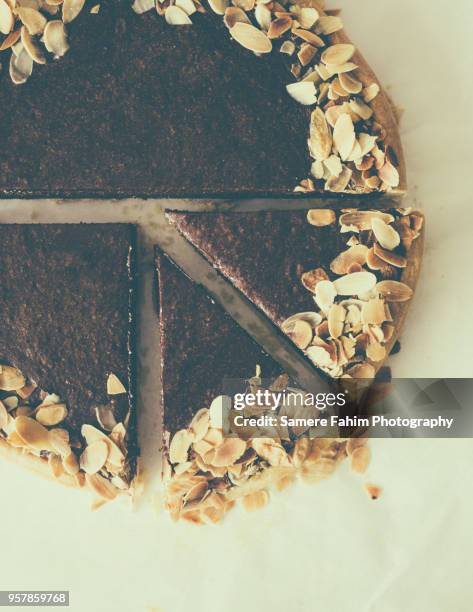 high angle view of chocolate pie with almonds - samere fahim bildbanksfoton och bilder