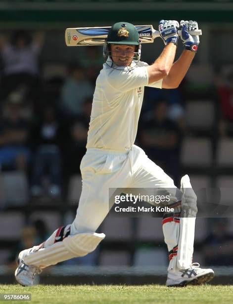 Nathan Hauritz of Australia square drives a ball during day two of the Third Test match between Australia and Pakistan at Bellerive Oval on January...
