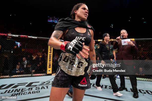 Amanda Nunes of Brazil celebrates victory over Raquel Pennington of the United States in their women's bantamweight bout during the UFC 224 event at...
