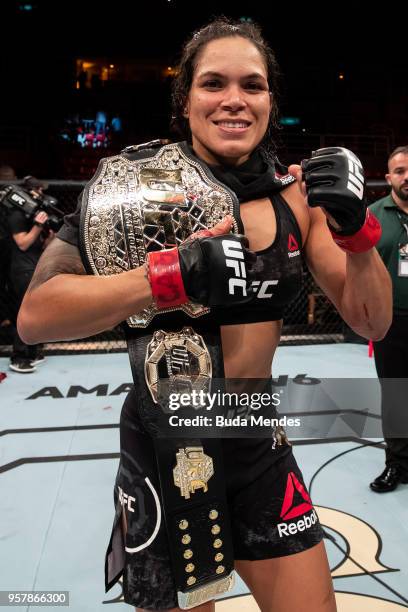 Amanda Nunes of Brazil celebrates victory over Raquel Pennington of the United States in their women's bantamweight bout during the UFC 224 event at...
