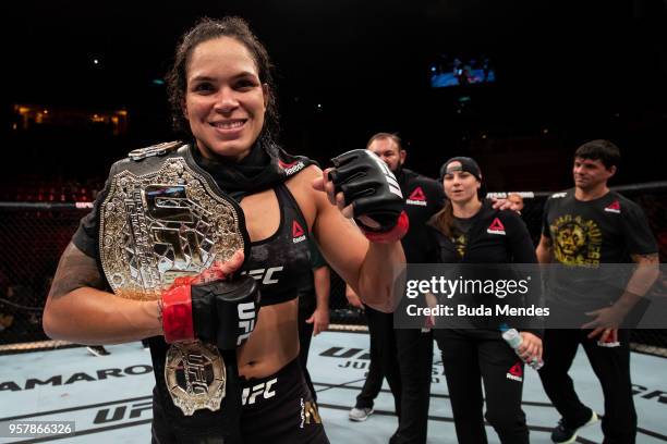 Amanda Nunes of Brazil celebrates victory over Raquel Pennington of the United States in their women's bantamweight bout during the UFC 224 event at...