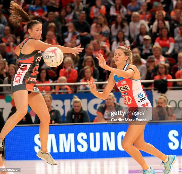 Susan Petitt of the Giants and Sophie Garbin of the Swifts compete for the ball during the round three Super Netball match between the NSW Swifts and...