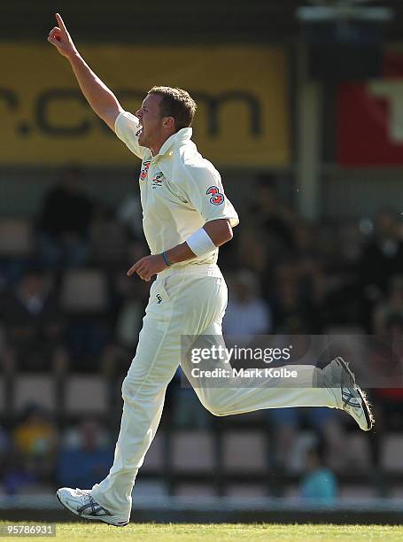 Peter Siddle of Australia celebrates taking the wicket of Khurram Manzoor of Pakistan during day two of the Third Test match between Australia and...