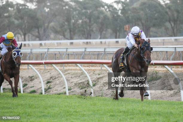 Smooth Hustler ridden by Georgina Cartwright wins the Frais Farms C,G&E BM58 Handicap at Bairnsdale Racecourse on May 13, 2018 in Bairnsdale,...