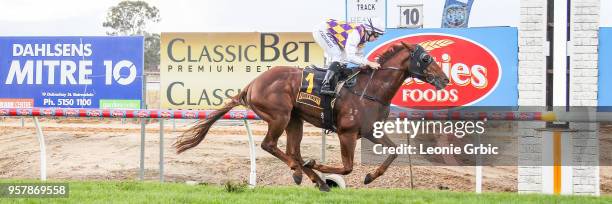 Smooth Hustler ridden by Georgina Cartwright wins the Frais Farms C,G&E BM58 Handicap at Bairnsdale Racecourse on May 13, 2018 in Bairnsdale,...