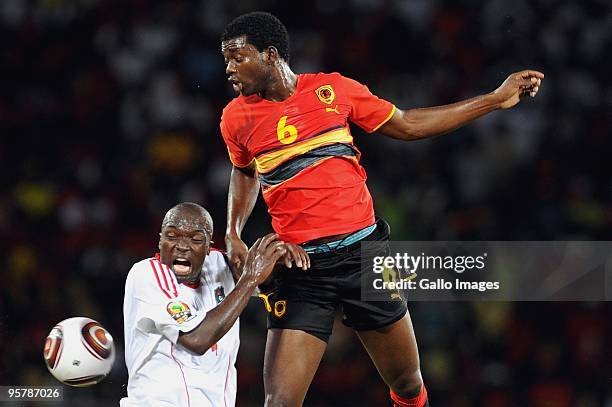 Angola's Mantorras challenge Chiukepo Msowoya of Malawi in action during the Africa Cup of Nations match between Angola and Malawi at Cidade...