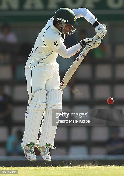 Umar Akmal of Pakistan plays a defensive shot during day two of the Third Test match between Australia and Pakistan at Bellerive Oval on January 15,...