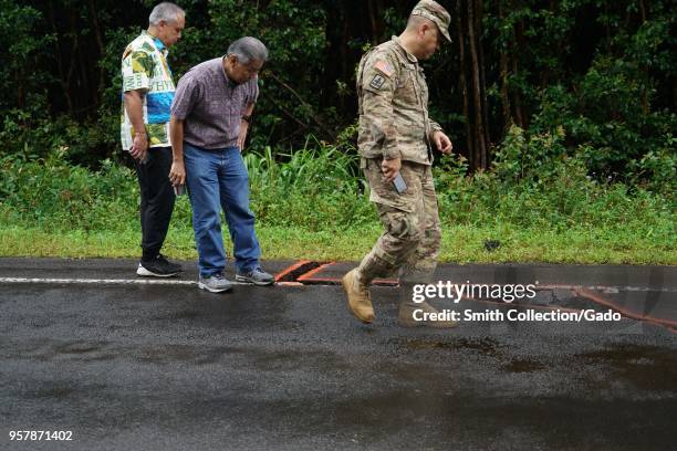 Hawaii National Guard Deputy Adjutant General Brig Gen Kenneth Hara and Hawaii Governor David Ige looking at a damaged roadway, Leilani Estates,...