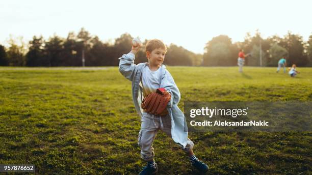 getting ready for the little league - playing catch stock pictures, royalty-free photos & images