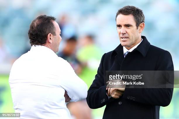 Raiders coach Ricky Stuart speaks to channel nine commentator and NSW Blues coach Brad Fittler before the start of the round 10 NRL match between the...