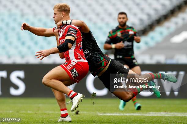 Jack De Belin of the Dragons is tackled during the round 10 NRL match between the South Sydney Rabbitohs and the St George Illawarra Dragons at ANZ...