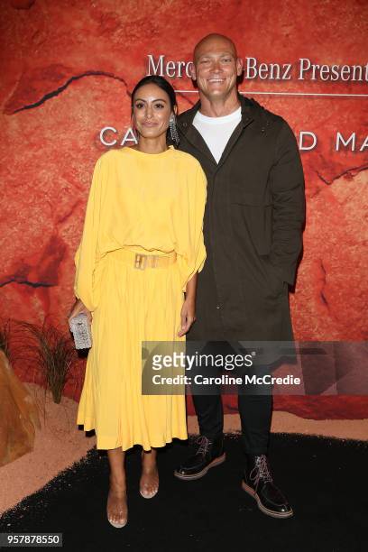 Michael Klim and partner Desiree Deravi arrive for the Mercedes-Benz Presents Camilla And Marc show at Mercedes-Benz Fashion Week Resort 19...