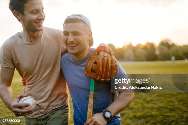 softball game - recreational sports league stock pictures, royalty-free photos & images
