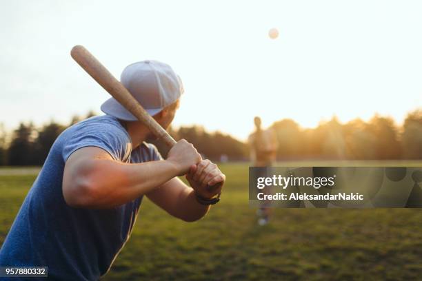 softball game - adult games stock pictures, royalty-free photos & images