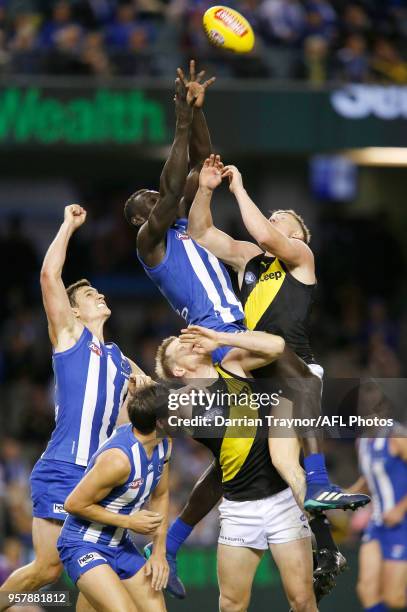 Majak Daw of the Kangaroos marks the ball during the round eight AFL match between the North Melbourne Kangaroos and the Richmond Tigers at Etihad...