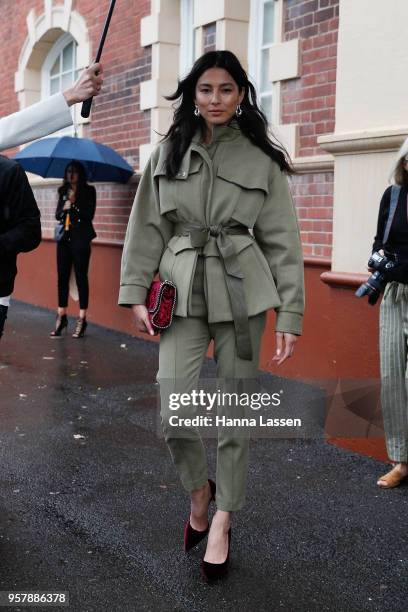 Jessica Gomes wearing Camilla and Marc suit and Stella McCartney clutch during Mercedes-Benz Fashion Week Resort 19 Collections at Carriageworks on...