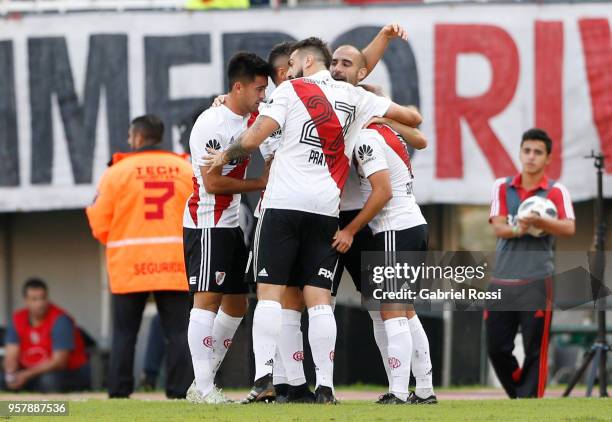 Javier Pinola of River Plate celebrates with teammates after scoring the first goal of his team during a match between River Plate and Estudiantes de...
