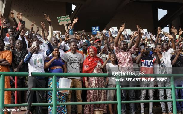 Supporters cheer for Union for the Republic and Democracy (Union pour la république et la démocratie, leader Soumaïla Cissé at a rally during the...