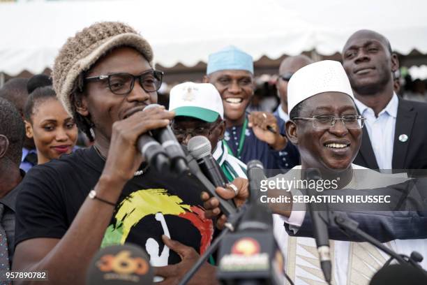 Malian activist Mohamed Youssouf Bathily - also known as Ras Bath - addresses the crowd as Union for the Republic and Democracy (Union pour la...