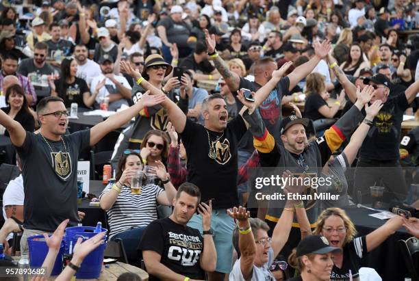 Fans including Esteban Rey of Nevada sing and dance as the Village People song "Y.M.C.A." is played during a Vegas Golden Knights road game watch...