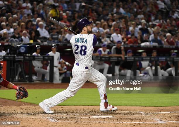 Steven Souza Jr of the Arizona Diamondbacks follows through on a swing against the Washington Nationals at Chase Field on May 10, 2018 in Phoenix,...