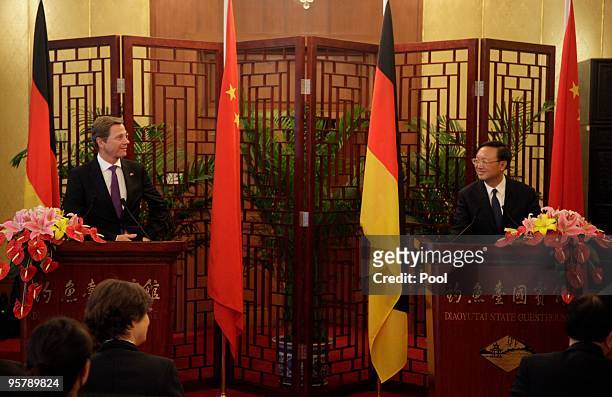 Chinese Foreign Minister Yang Jiechi talks with Germany's Vice Chancellor and Foreign Minister Guido Westerwelle before a meeting at the Diaoyutai...