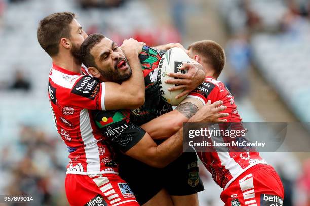 Greg Inglis of the Rabbitohs is tackled during the round 10 NRL match between the South Sydney Rabbitohs and the St George Illawarra Dragons at ANZ...
