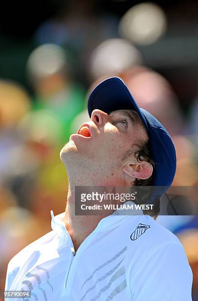 Sam Querrey of the US reacts during his loss to Andy Murray of Britain in an exhibition match at the Kooyong Classic tennis tournament in Melbourne...
