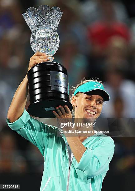 Elena Dementieva of Russia holds the trophy aloft after winning the women's final match against Serena Williams of the USA during day six of the 2010...