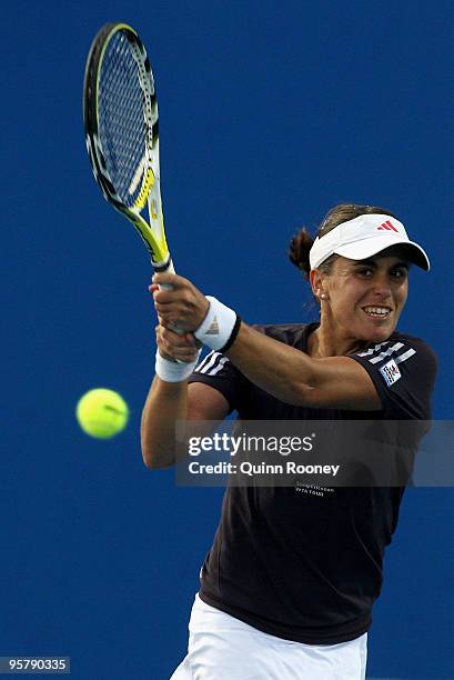 Anabel Medina Garrigues of Spain plays a backhand in her semi final match against Alona Bondarenko of the Ukraine during day eight of the Moorilla...