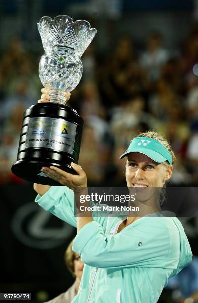 Elena Dementieva of Russia holds the trophy aloft after winning the women's final match against Serena Williams of the USA during day six of the 2010...