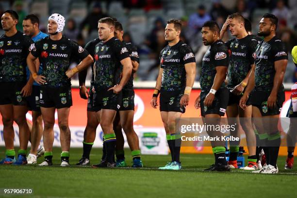 The Raiders look dejected after a Sharks try during the round 10 NRL match between the Canberra Raiders and the Cronulla Sharks at GIO Stadium on May...