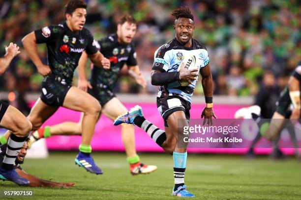 James Segeyaro of the Sharks makes a break during the round 10 NRL match between the Canberra Raiders and the Cronulla Sharks at GIO Stadium on May...