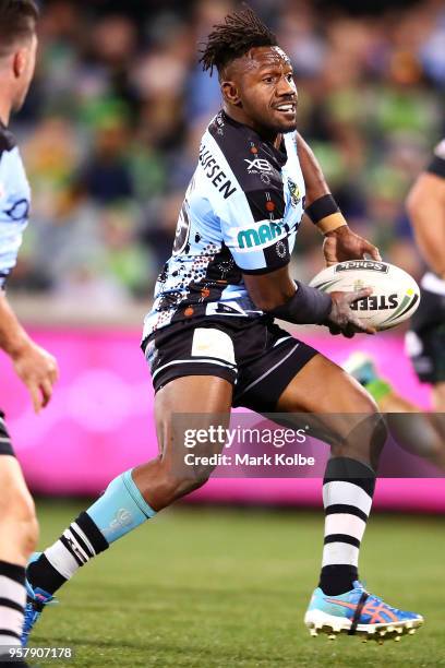 James Segeyaro of the Sharks makes a break during the round 10 NRL match between the Canberra Raiders and the Cronulla Sharks at GIO Stadium on May...