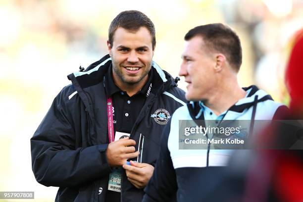 Injured Sharks players Wade Graham and Paul Gallen share a joke during the round 10 NRL match between the Canberra Raiders and the Cronulla Sharks at...