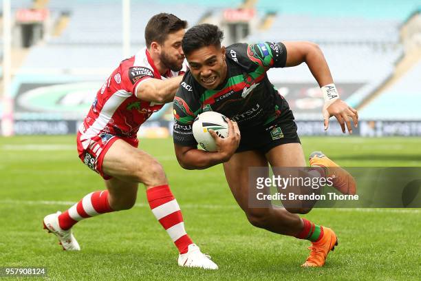 Hymel Hunt of the Rabbitohs dives to score a try during the round 10 NRL match between the South Sydney Rabbitohs and the St George Illawarra Dragons...